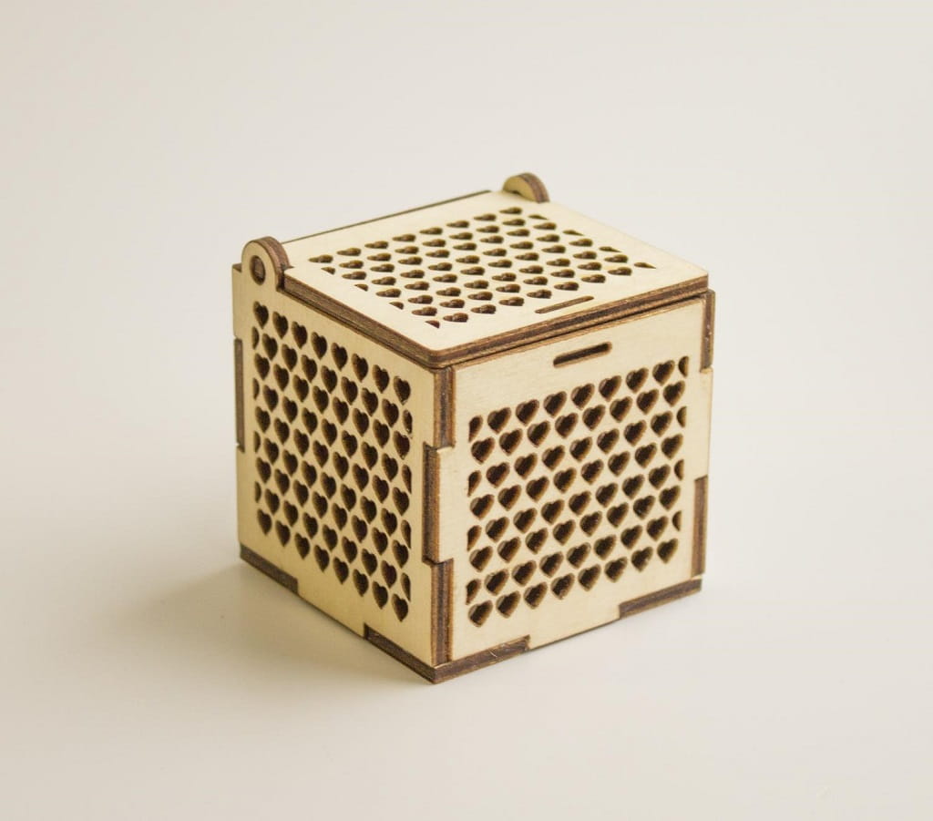 Laser Cut Wooden Jewelry Box With Heart Cutout Pattern